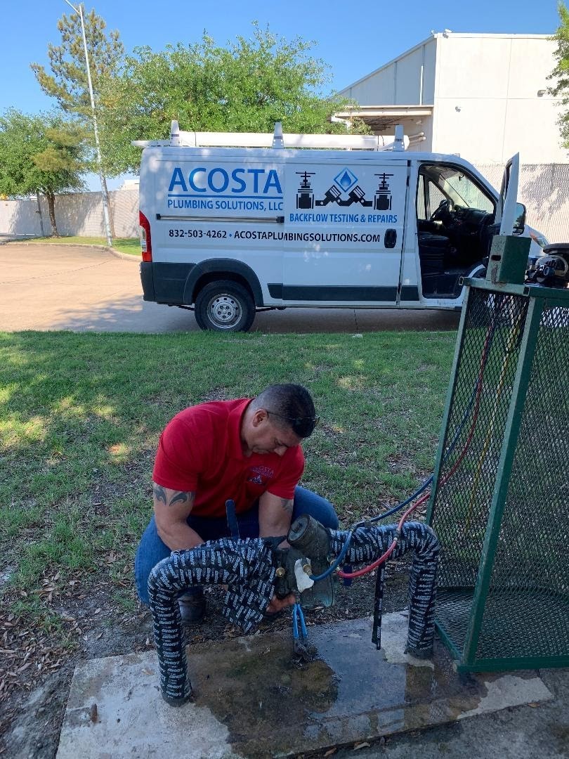 Plumber Fixing the Pipes