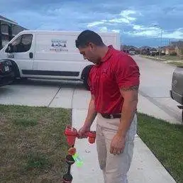 Plumber Fixing The Pipes